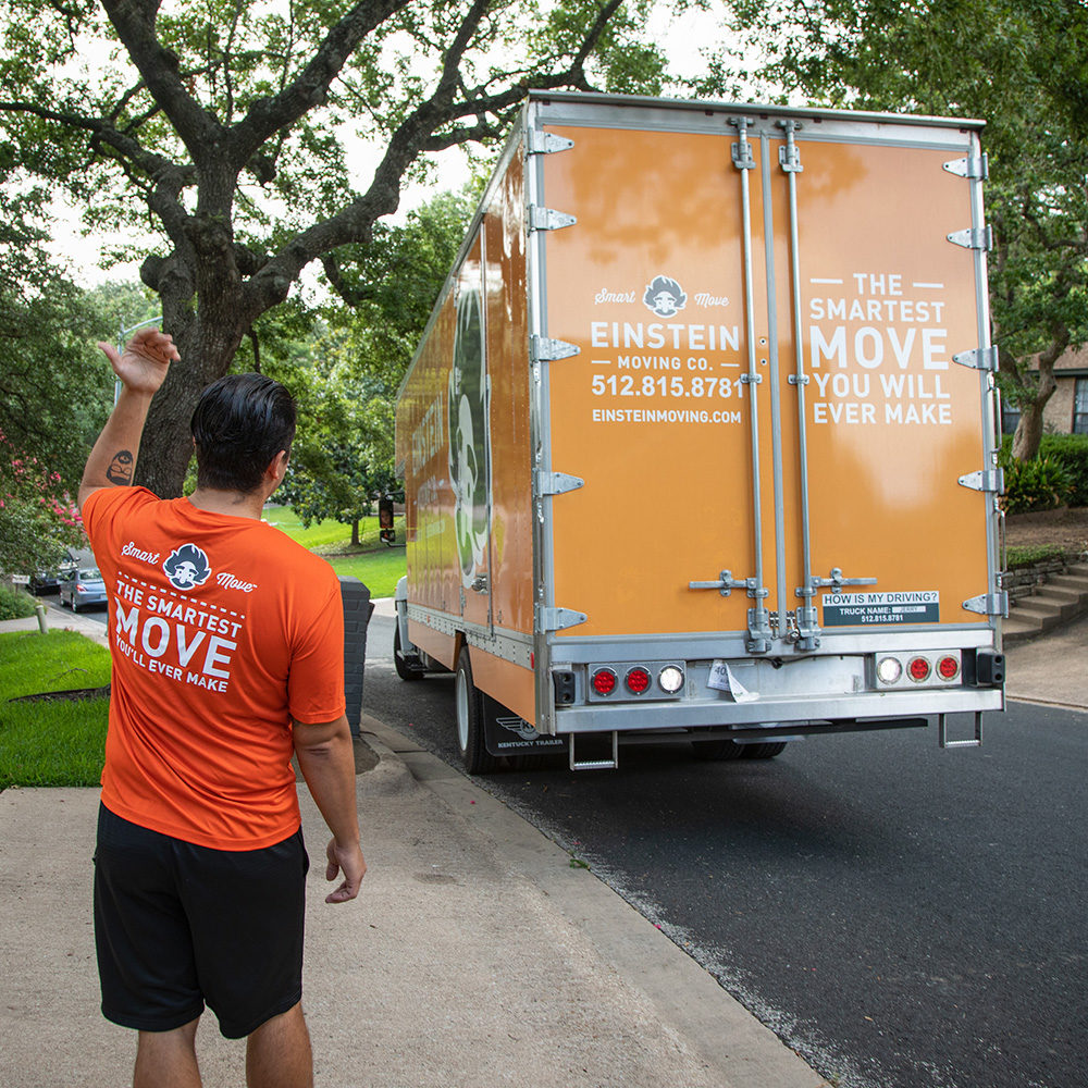 An Einstein mover guides a truck backing up