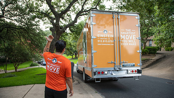 An Einstein mover guides a truck backing up