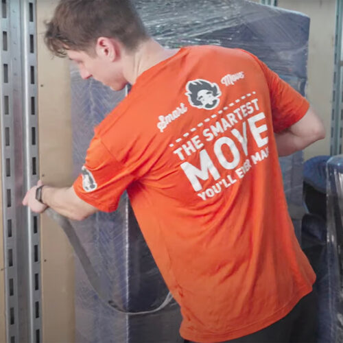 A mover from Einstein prepares for a busy day of moving